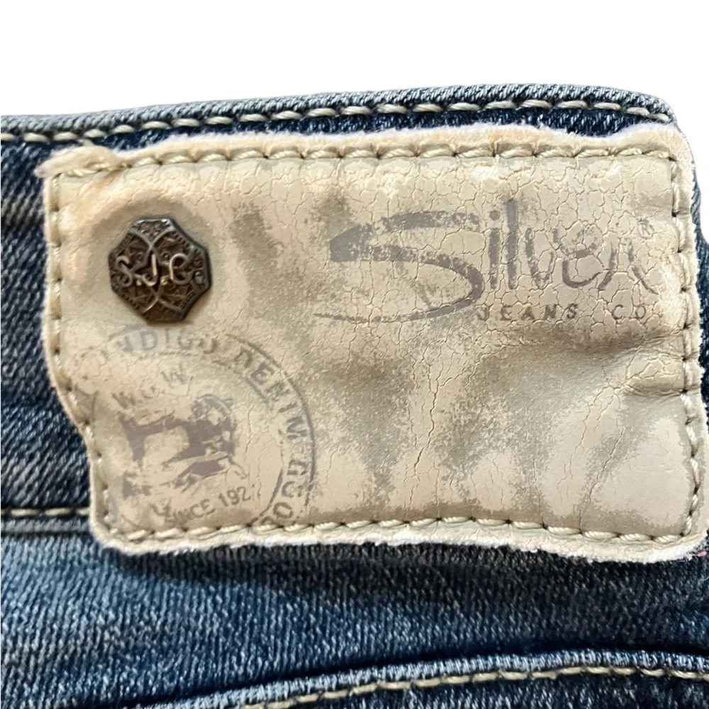 Y2K Vintage Silver Suki Mid Rise Capris with Embroidered S Scroll Pockets Sz 28